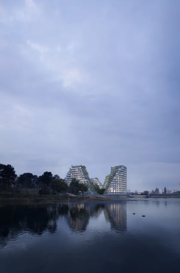 Dusk render of a lakeside residential complex in Tirana by PLEM Visual Tales